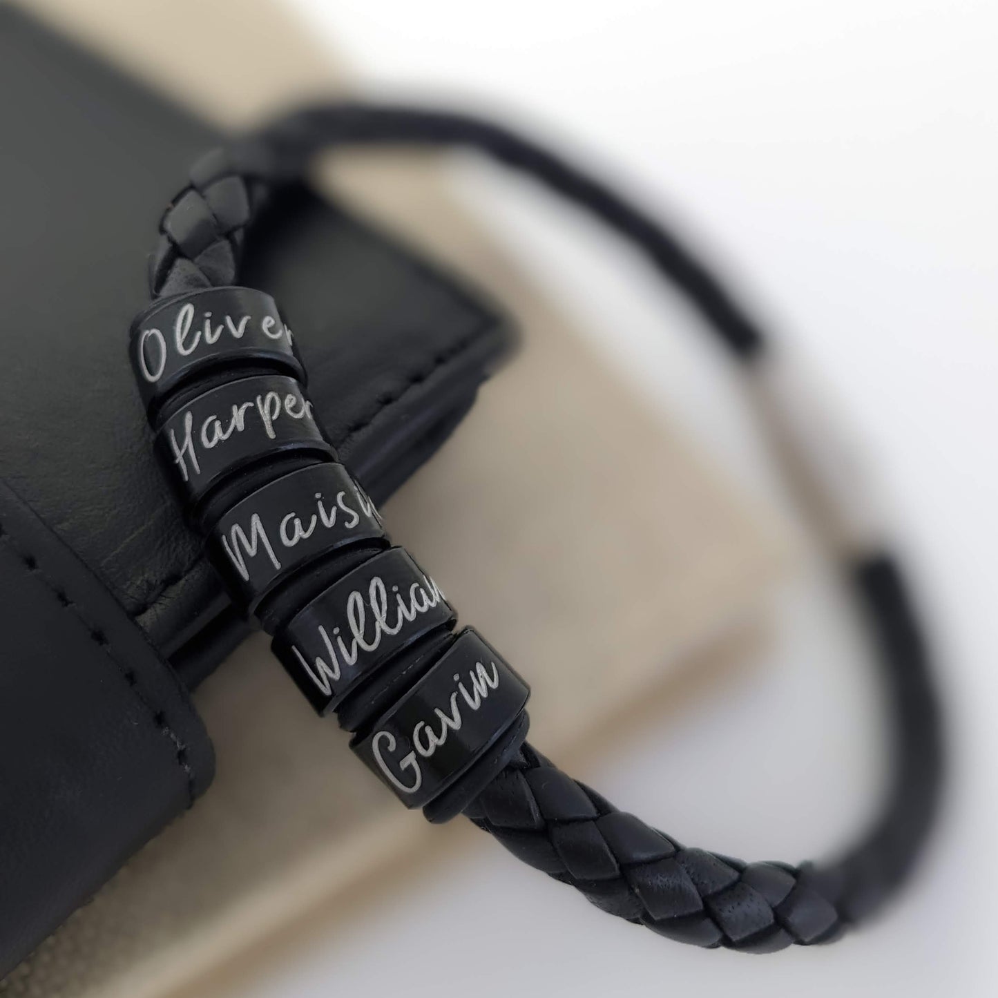 Personalized Mens Leather Bracelet With Black Name Rings