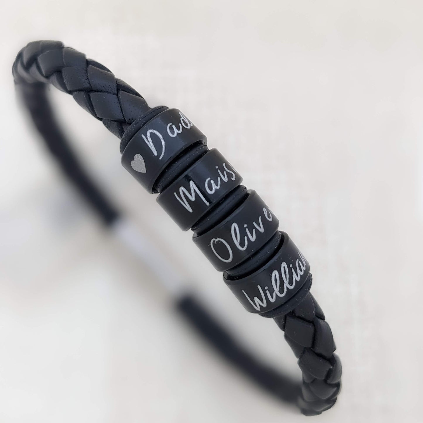 Personalized Mens Leather Bracelet With Black Name Rings